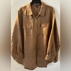 A Very Comfortable Top that’s layered with 
an over Long Sleeve Shirt.